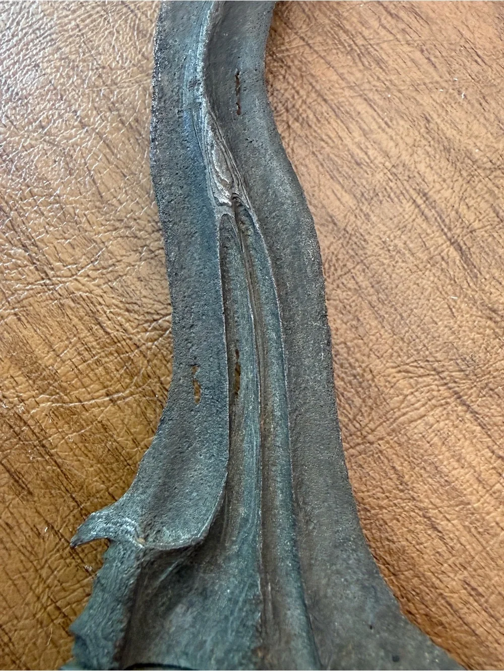 Antique Keris a traditional asymmetrical dagger with a wavy blade from Indonesia